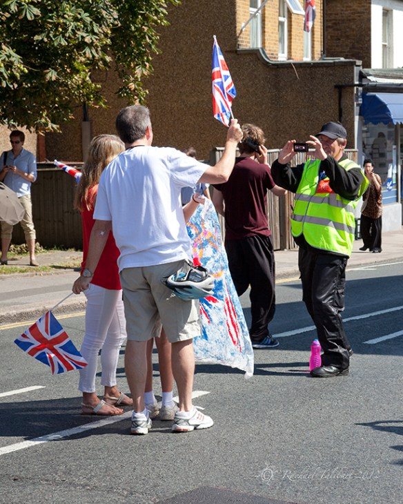Steward takes family's photo Olympic road race 2012